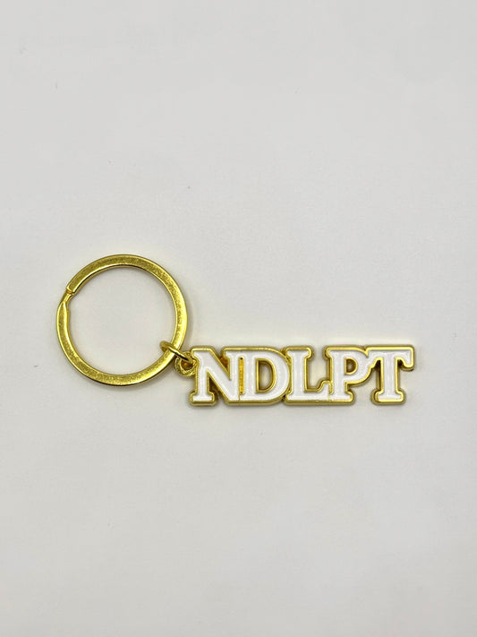 NDLPT Needlepoint Enamel Keychain